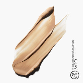 Olay Total Effects bottle with label indicates daily moisture and tone correction.