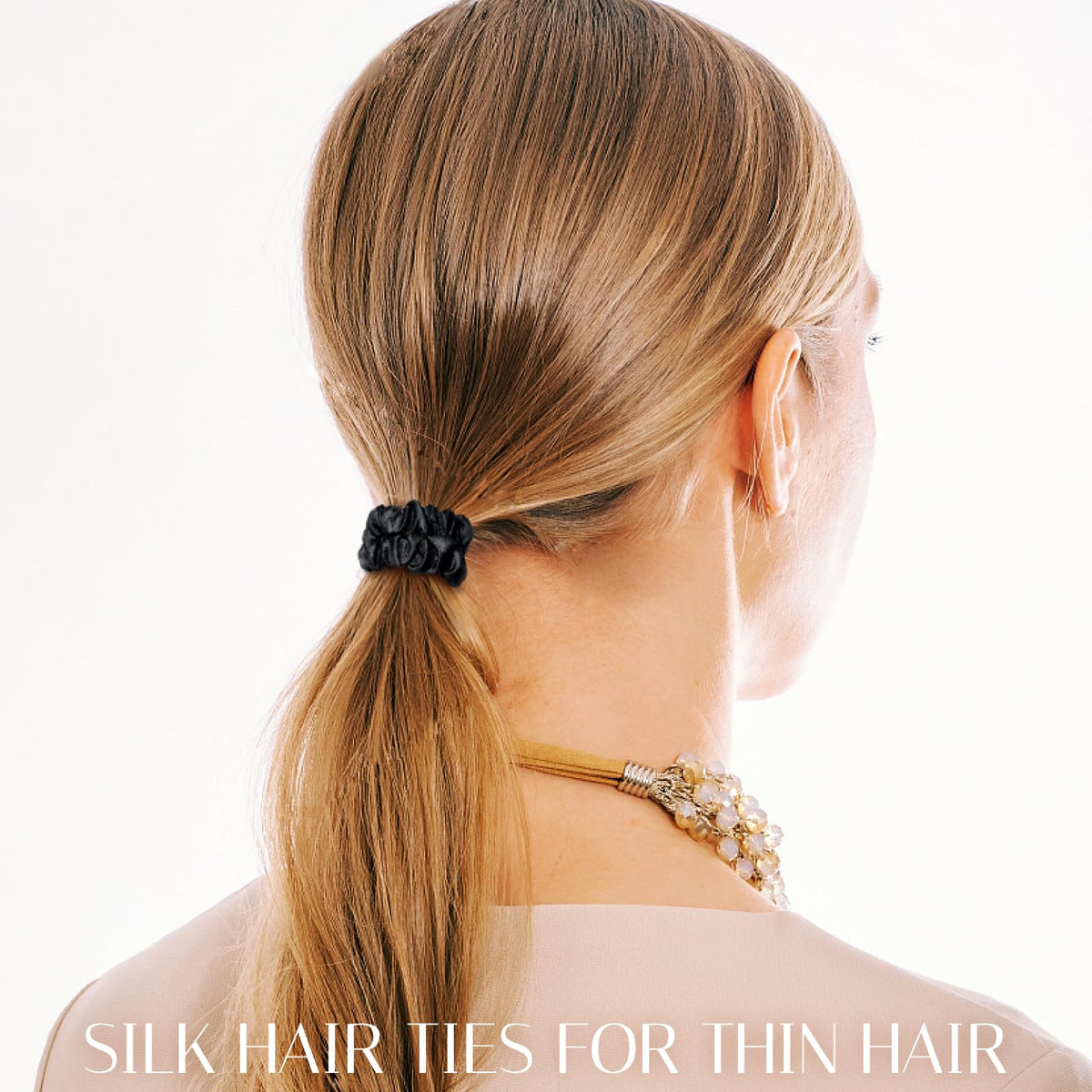 OLESILK close-up of Mulberry silk fabric showing smooth texture for gentle hair care.