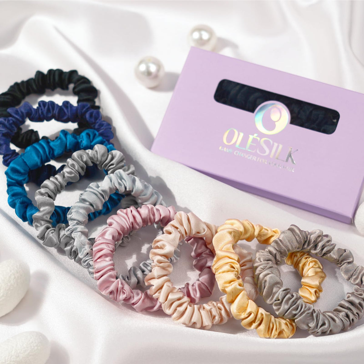 OLESILK 5-pack black silk hair ties for versatile styling.