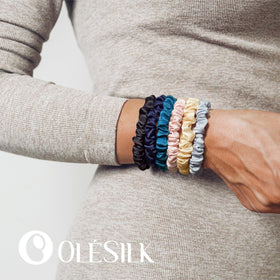 OLESILK hair tie worn on wrist as a stylish bracelet.