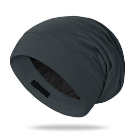OLESILK silk sleep bonnet in dark grey protects hair overnight with soft, gentle fabric.