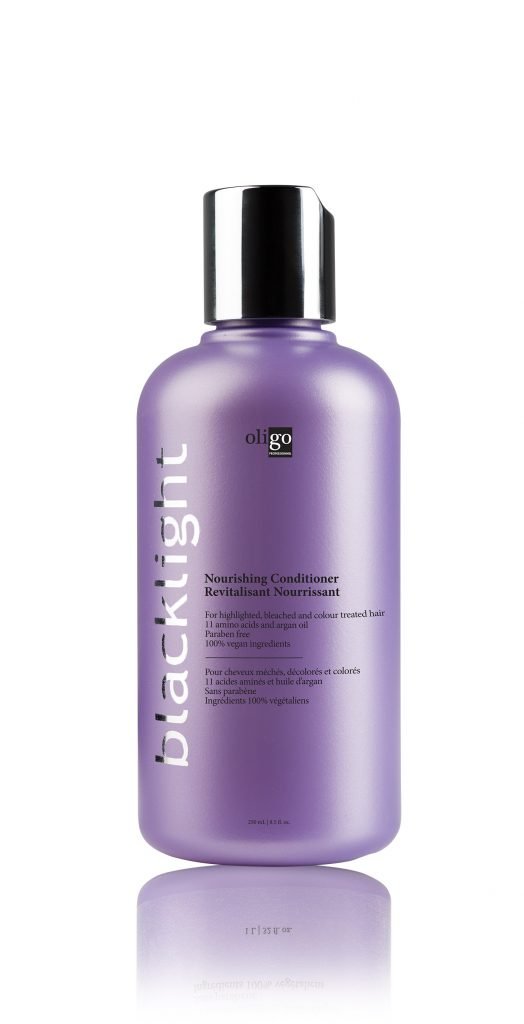 Oligo Blacklight Nourishing Conditioner bottle shows sulfate-free care for color-treated hair.