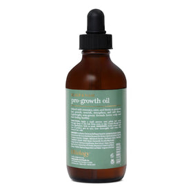 Oliology rosemary mint oil bottle highlighting shine and easy manageability.