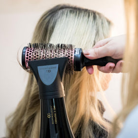 Olivia Garden 1875W hair dryer in use for everyday styling.