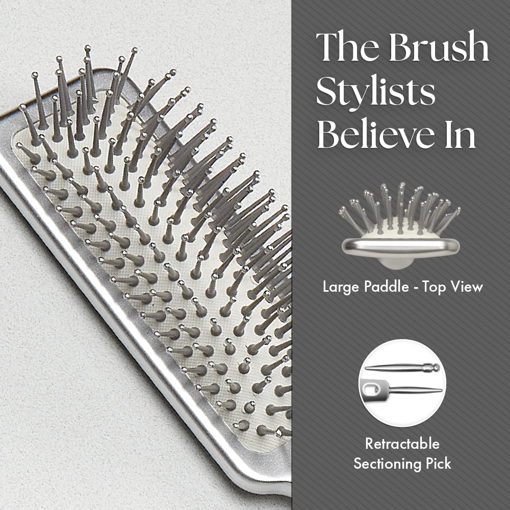 Retractable sectioning pick aids precise parting with Olivia Garden brush.