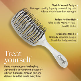 Olivia Garden iDetangle dual-curve design hugs scalp for luxurious brushing feel