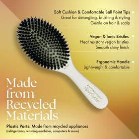Close-up of Olivia Garden NewCycle cushion base for comfortable detangling during styling.