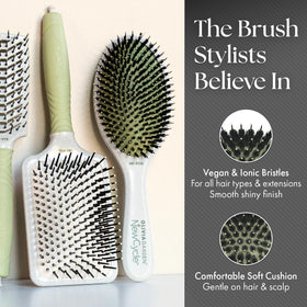 Ergonomic handle on Olivia Garden NewCycle round brush supports steady grip sessions.