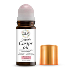 OLV Organic Castor Oil with Rose Quartz Roller for precise, mess-free skin nourishment.