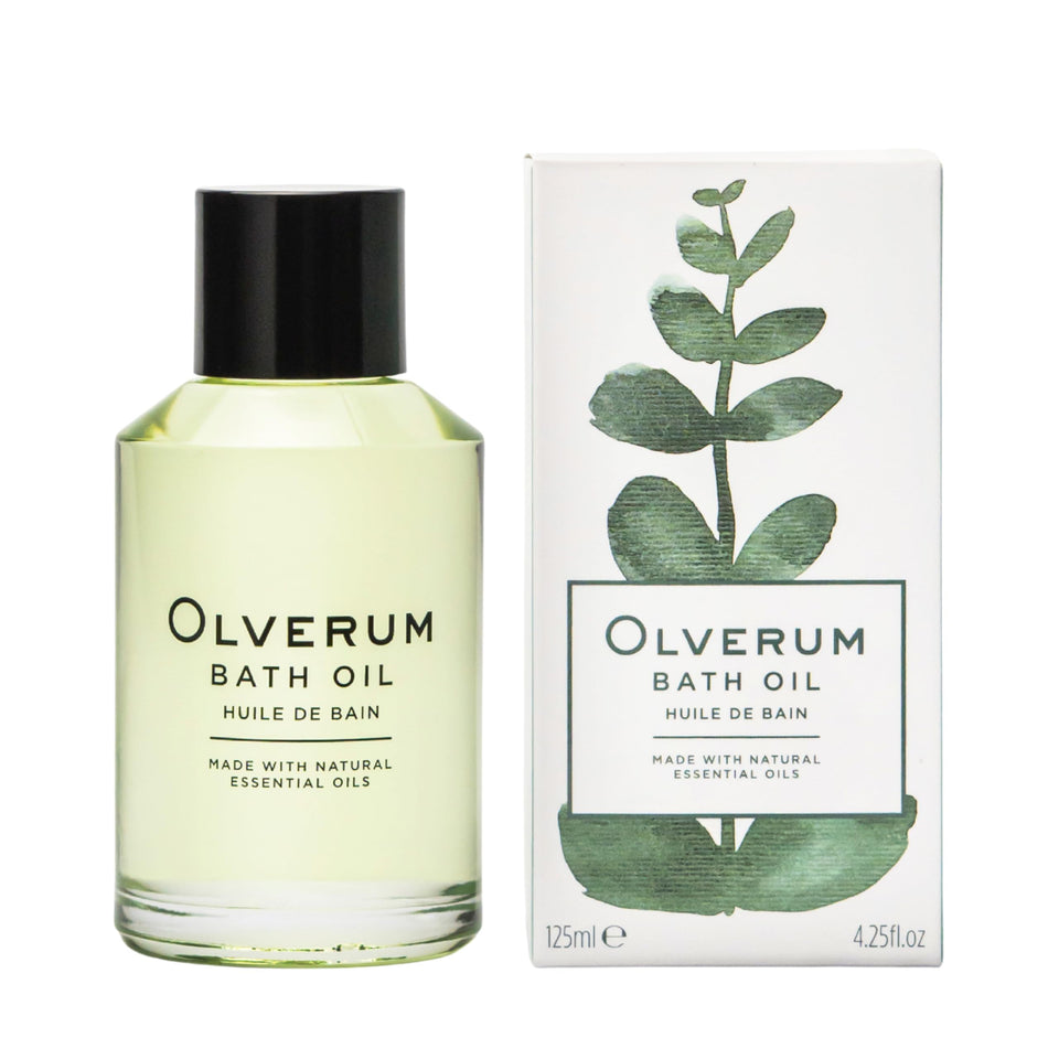 OLVERUM bath oil bottle on a clean surface signaling premium self care.