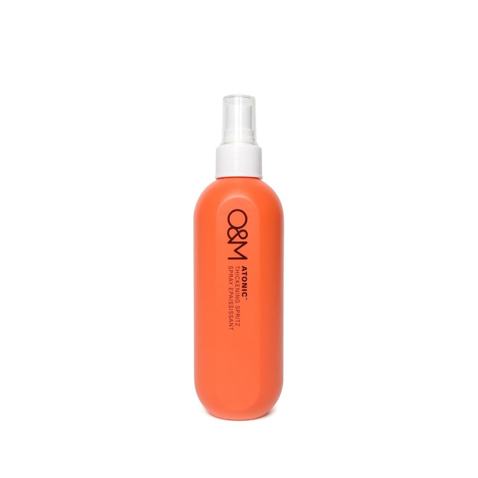 O&M Atonic thickening spray bottle boosts volume for fuller hair.