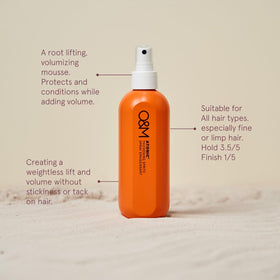O&M Atonic vegan cruelty-free label signals clean, ethical hair care.