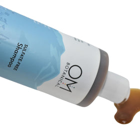 OM Botanical daily wash for men and women in bathroom setting.