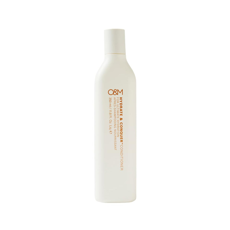 O&amp;M Hydrate & Conquer conditioner bottle shows hydration for dry hair