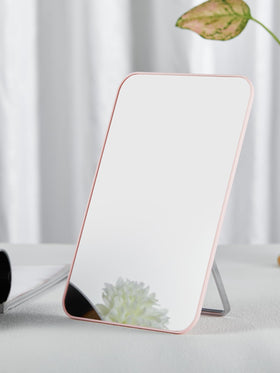 OMIRO compact 8x5 inch mirror is a lightweight travel companion for on-the-go grooming
