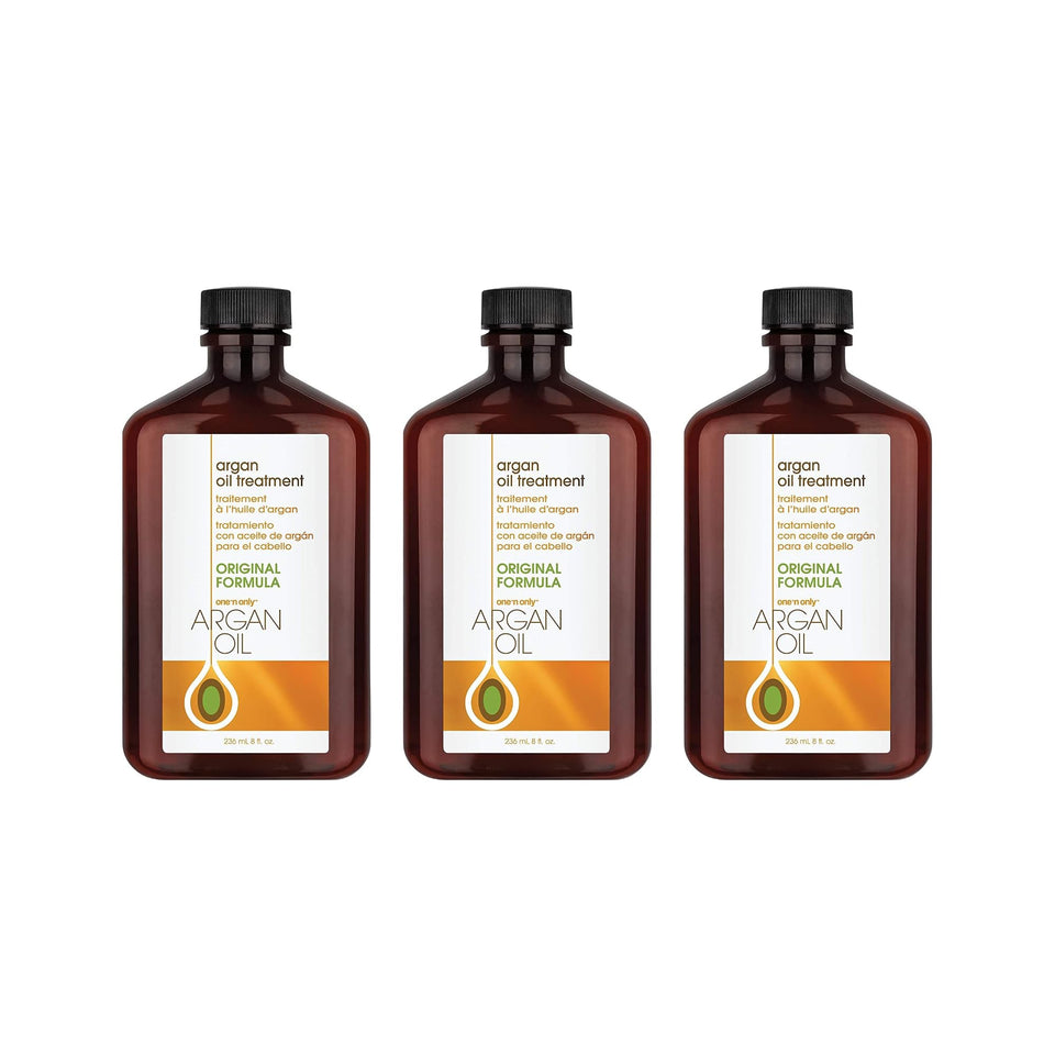 One 'N Only Argan Oil Hair Treatment bottle pour showing quick absorption and shine