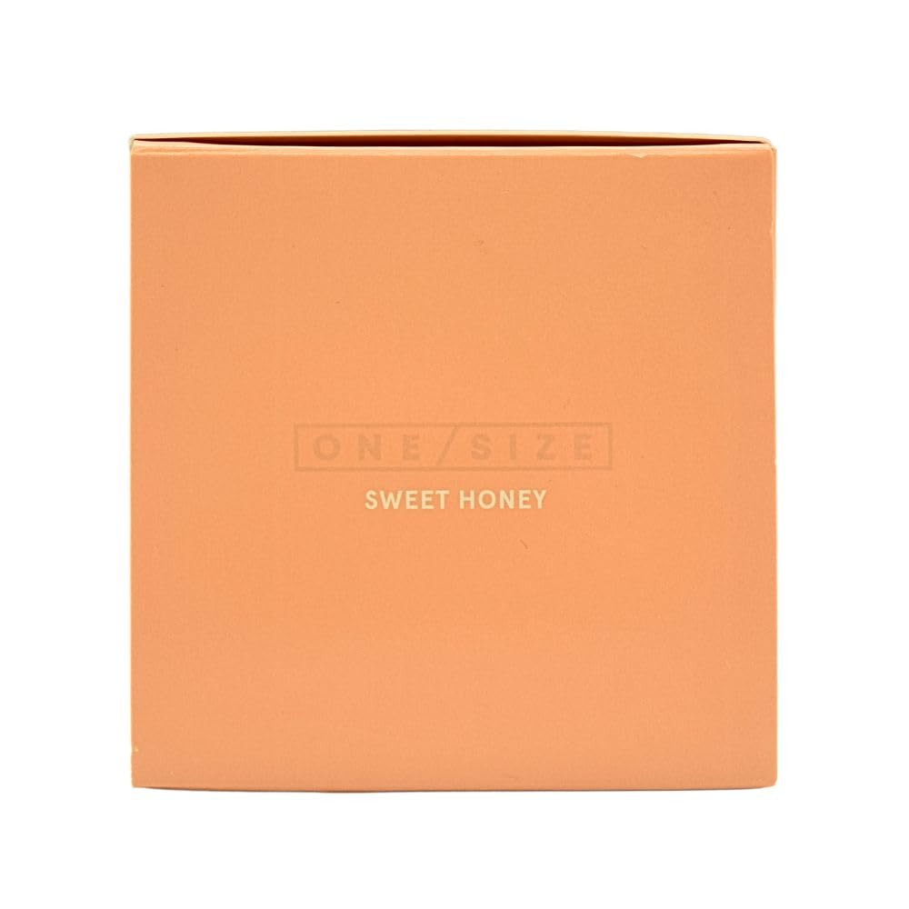 One/Size Ultimate Setting Powder Sweet Honey application tool ready for precise touch-ups.