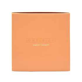 One/Size Ultimate Setting Powder Sweet Honey application tool ready for precise touch-ups.