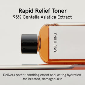 Close-up of ONE THING Toner being patted on skin for calming relief
