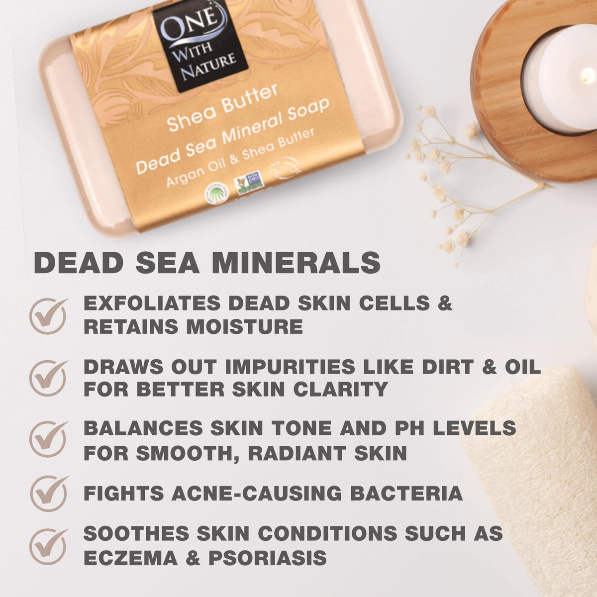 Creamy lather forming from One With Nature Dead Sea Salt Shea Butter Soap on skin.