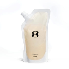 oneskin PREP refill pouch close-up showing a gentle daily cleanser that respects the skin barrier.