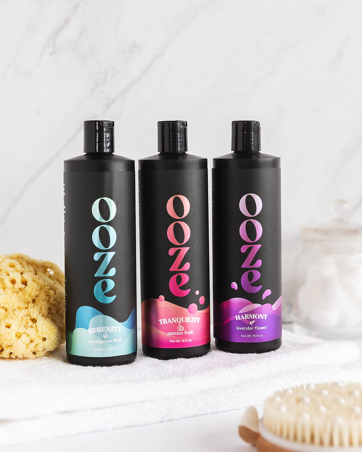 Creamy foam from OOZE Passion Fruit Bubble Bath fills the tub for a soothing routine