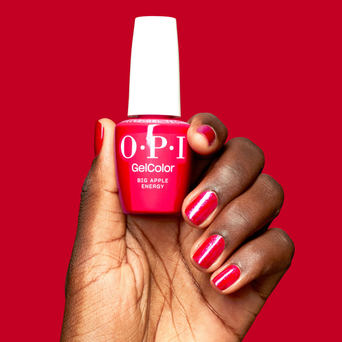 OPI GelColor Big Apple Energy bottle under LED lighting highlights bright color.