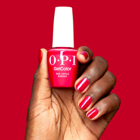 OPI GelColor Big Apple Energy bottle under LED lighting highlights bright color.