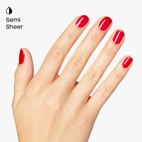 Close-up of glossy Big Apple Energy nails with shimmering finish.
