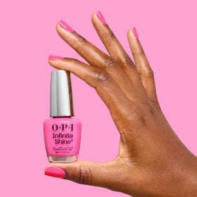 OPI Infinite Shine Beat Goes Neon in sunlight captures photo-ready summer glow.