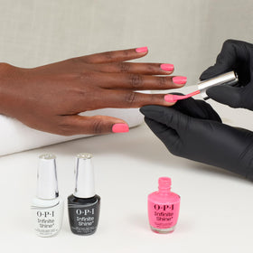 OPI Infinite Shine Lei Out in the Sun bottle in shade showing color depth and reflection.