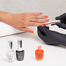 OPI Infinite Shine Shock Em Orange gloss detail on nail for luminous look
