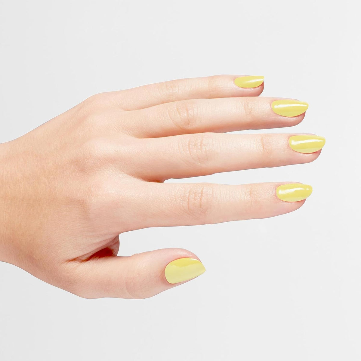 Top coat seals banana yellow shade with a high gloss finish
