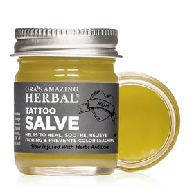 Ora's Amazing Herbal tattoo salve front view on jar supports gentle healing for new tattoos.