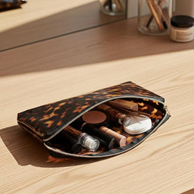 ORBENTO Retro tortoise makeup bag closeup print emphasizes durable water-resistant fabric.