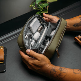 Orbitkey external zip pocket with cable pass-through keeps cords tangle-free.