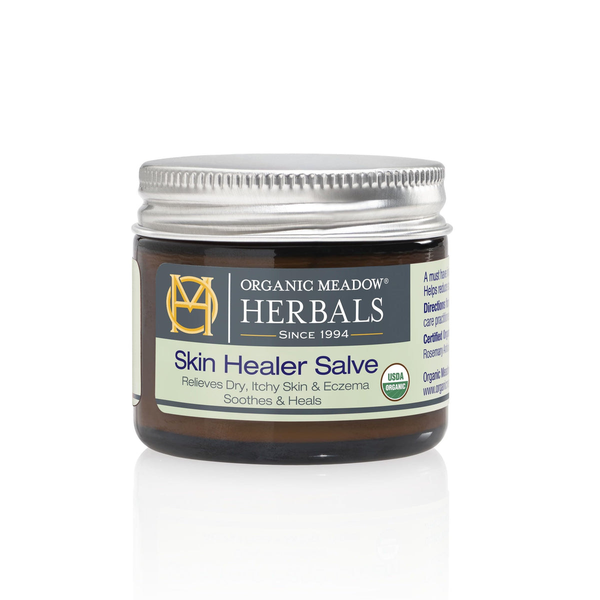 Organic Meadow Herbals Skin Healer Salve jar for soothing skin.