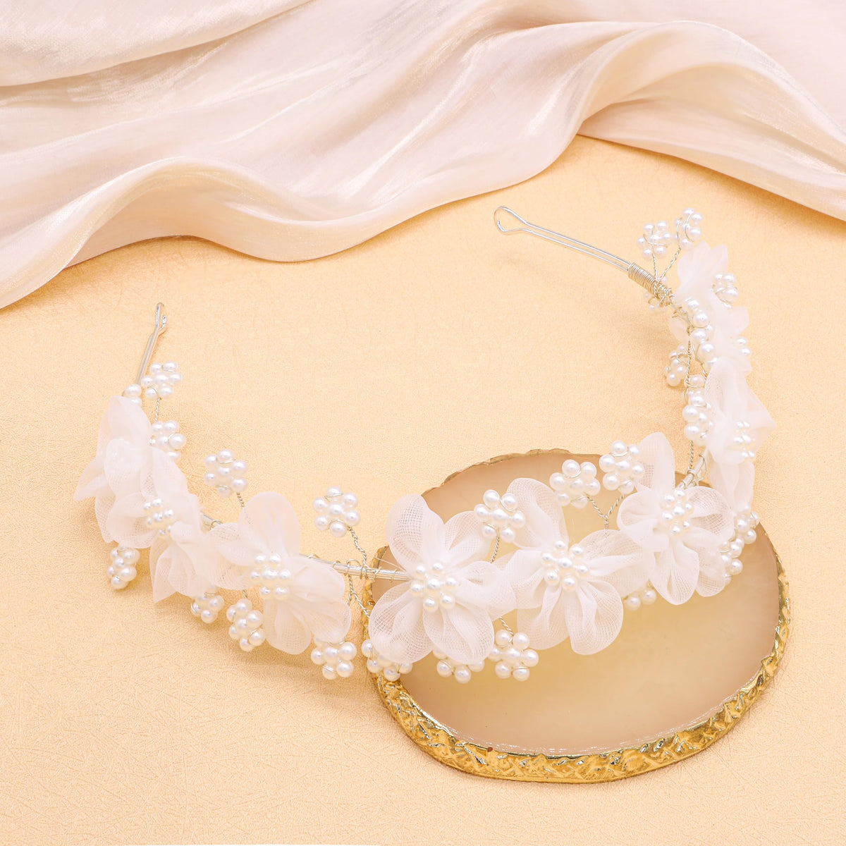 Oriamour girls' headband worn with a light dress completes a fairytale look.