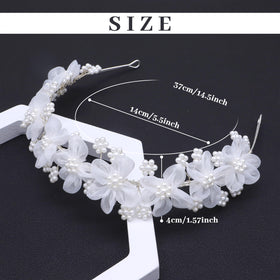 Oriamour flower headpiece worn during party time adds whimsical charm.