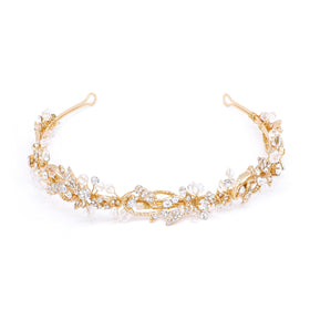 Oriamour rhinestone bridal headband in gold adds subtle sparkle to the wedding day look.