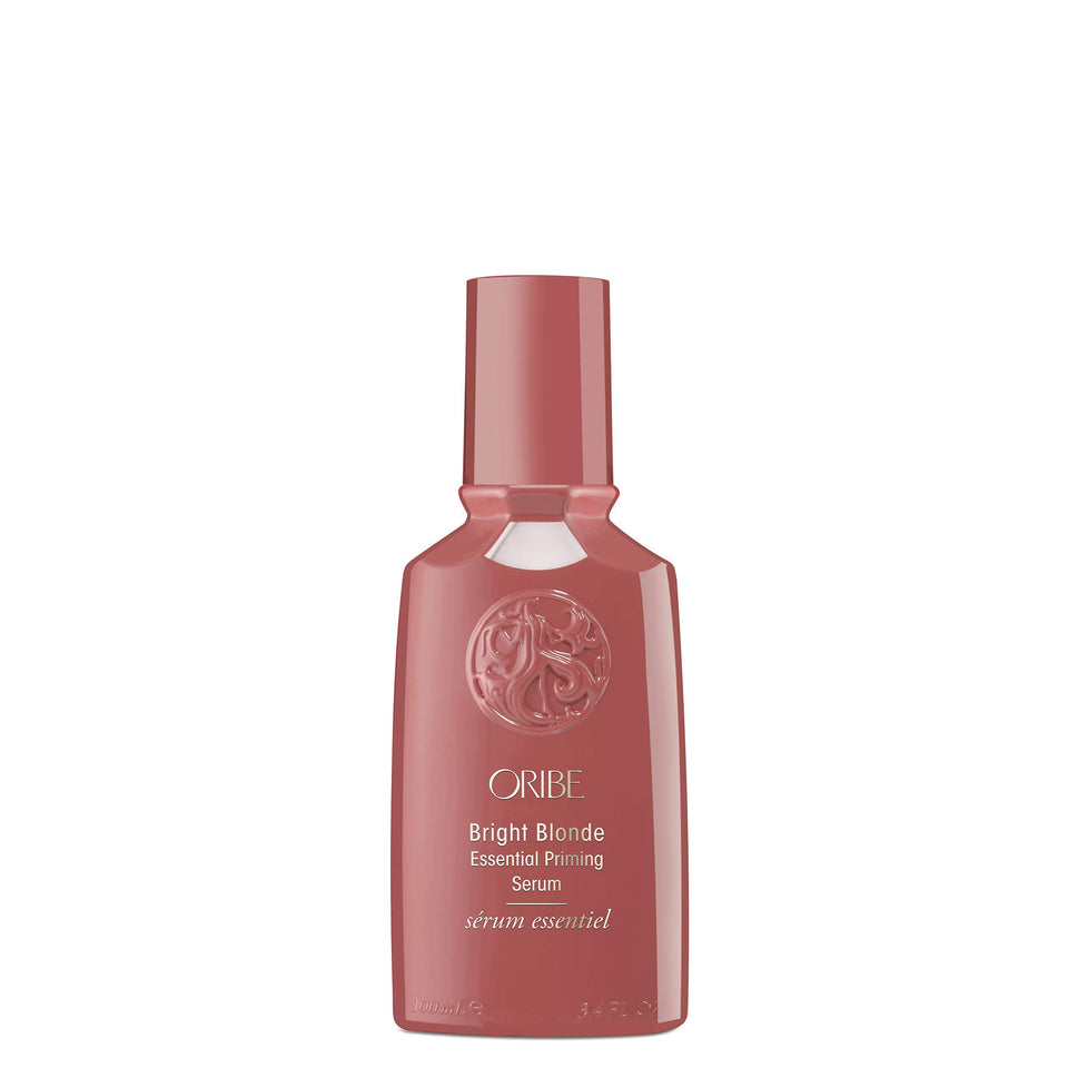 ORIBE Bright Blonde Essential Priming Serum bottle highlighting violet pigments for toning brassiness