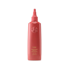 Oribe Bright Blonde Radiance Treatment bottle with violet pigments to reduce brassiness