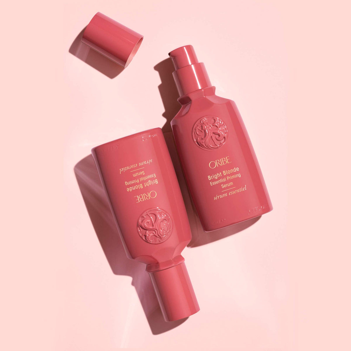 ORIBE Bright Blonde serum in hand demonstrating quick application before styling