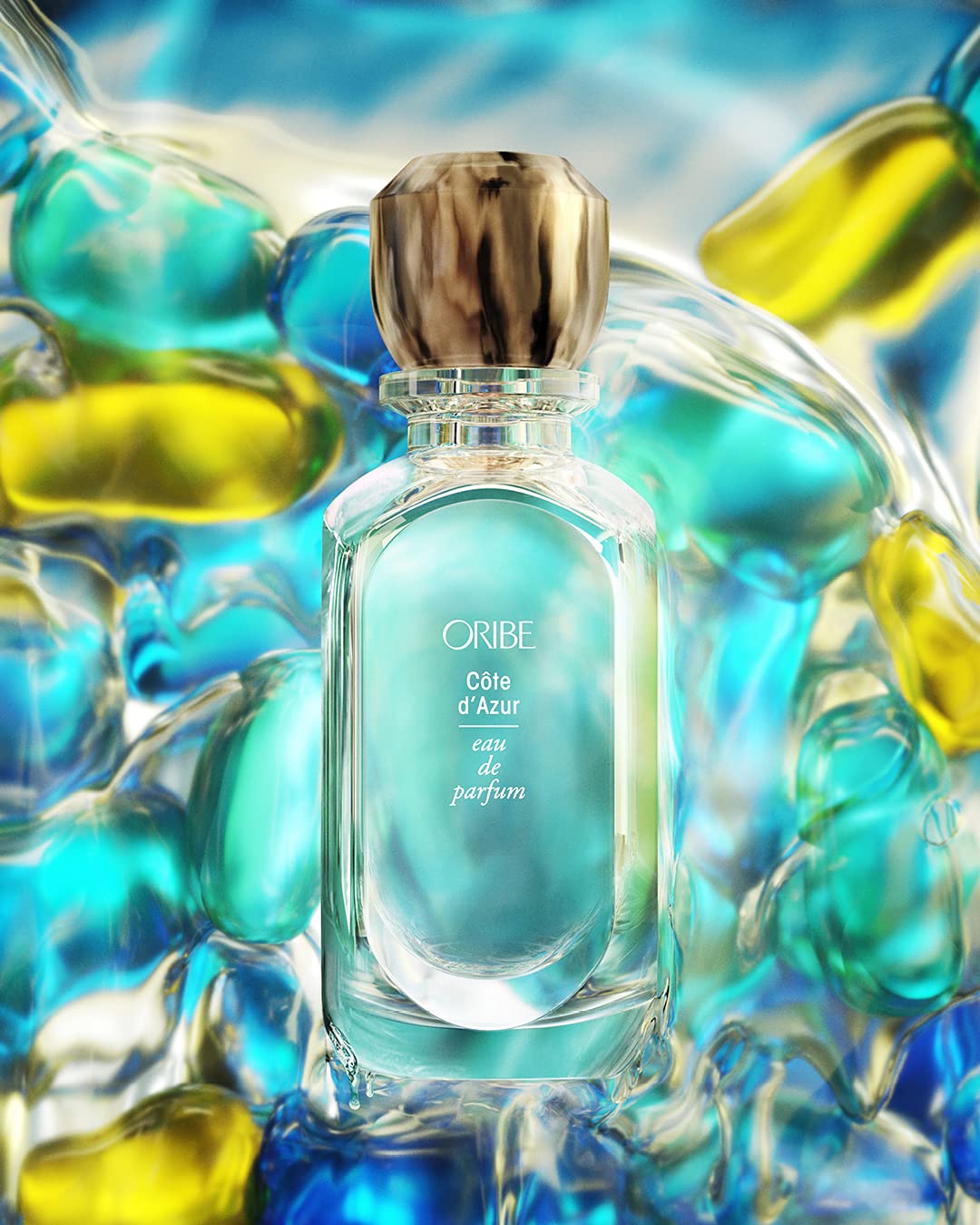 Oribe Côte d'Azur EDP bottle side, elegant vanity display