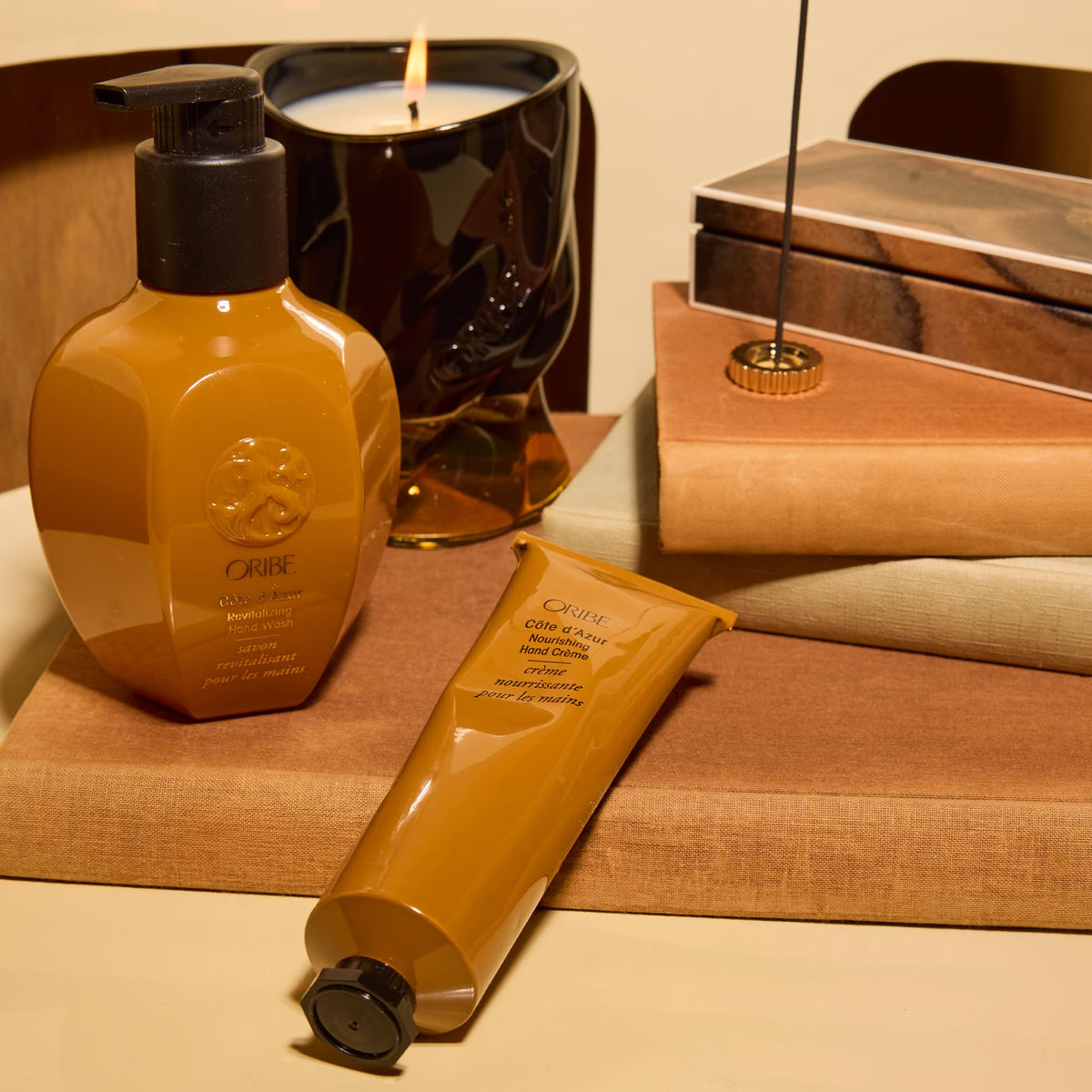 Oribe Côte d’Azur Nourishing Hand Crème application on hand shows quick absorption.