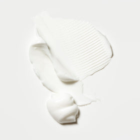 Oribe Côte d’Azur Nourishing Hand Crème texture swatch highlighting rich, non-greasy feel.