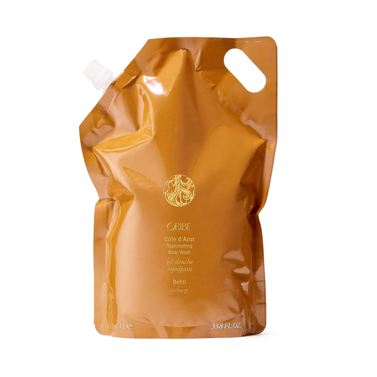 Oribe Côte d’Azur refill bottle showcases sustainable replenishment and luxury cleansing.