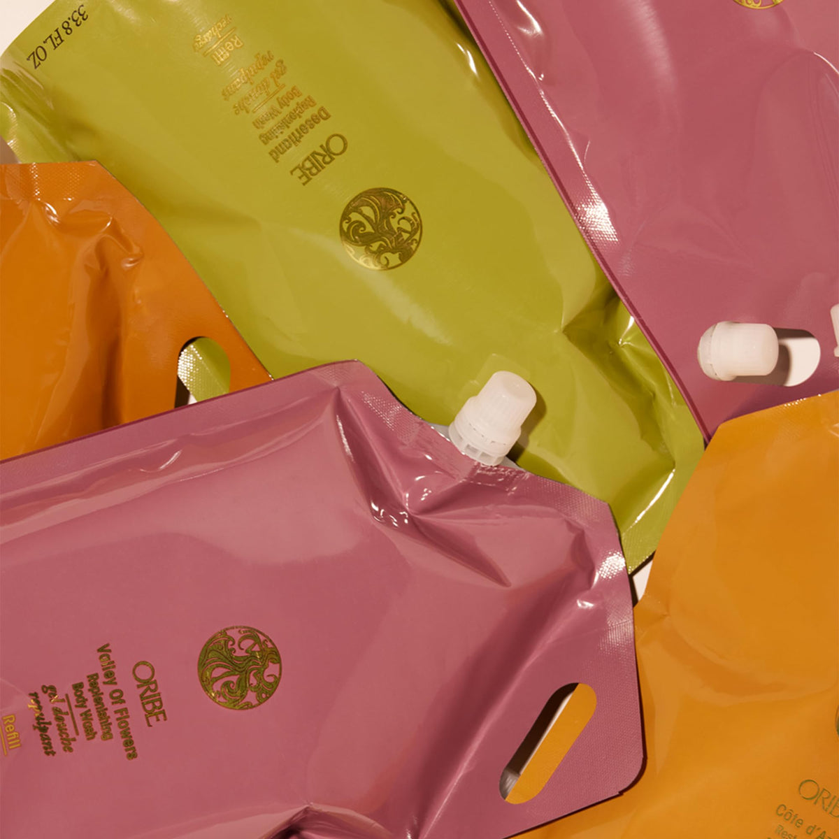 Oribe Côte d’Azur travel refill demonstrates eco-friendly care on the go.