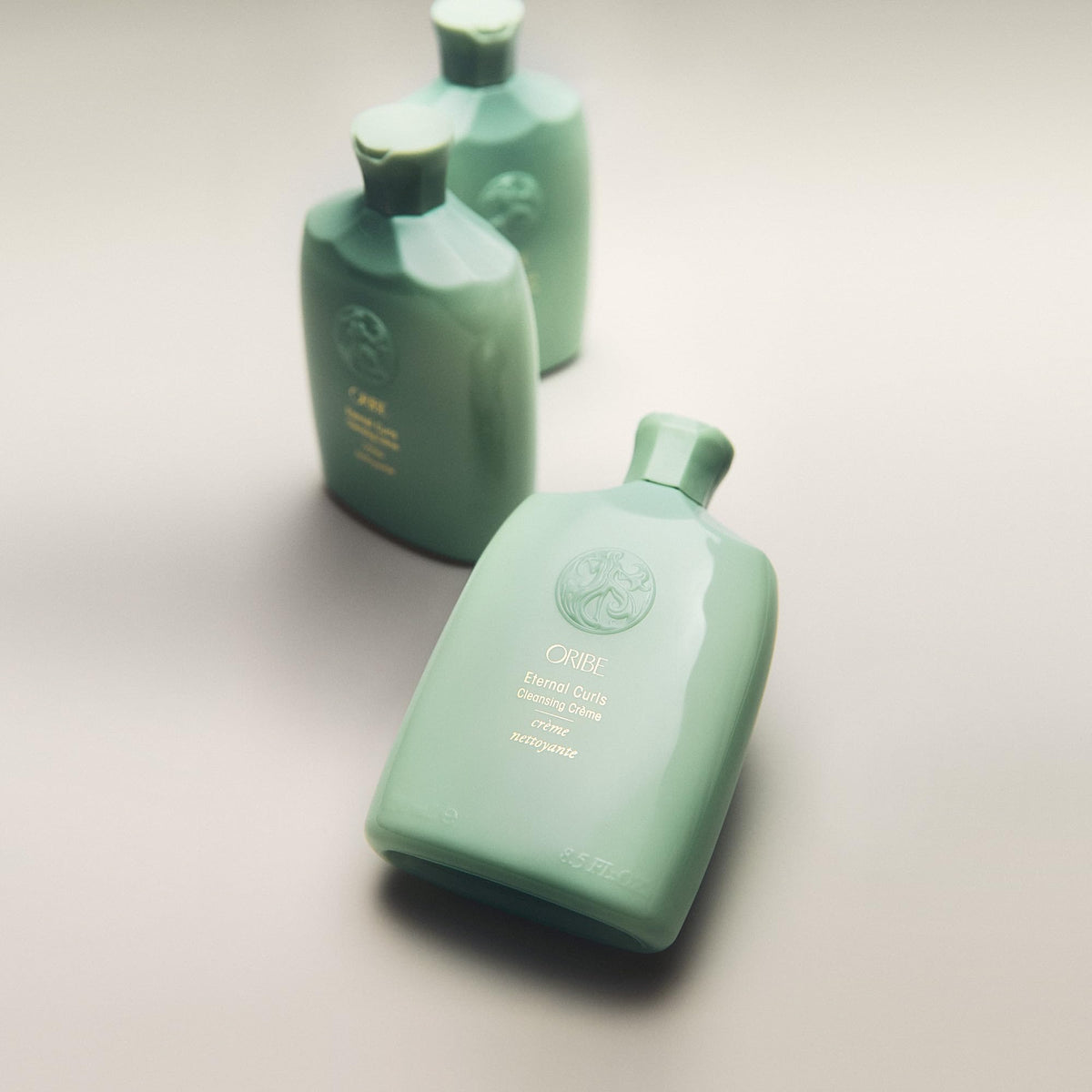 Closeup of ORIBE Eternal Curls Cleansing Cream texture demonstrates creamy nourishment.