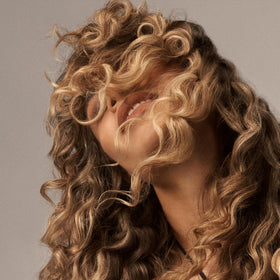 ORIBE Eternal Curls Cleansing Cream oils visual shows purifying blend for scalp refresh.